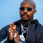 Asake announcing his fourth studio album M$NEY release date with marble statue artwork reveal on social media