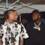Davido and Chris Brown announcing their 2027 joint album collaboration blending Afrobeats and R&B