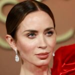 Emily Blunt red carpet French tip manicure with glossy red polish and pearl floral nail art design