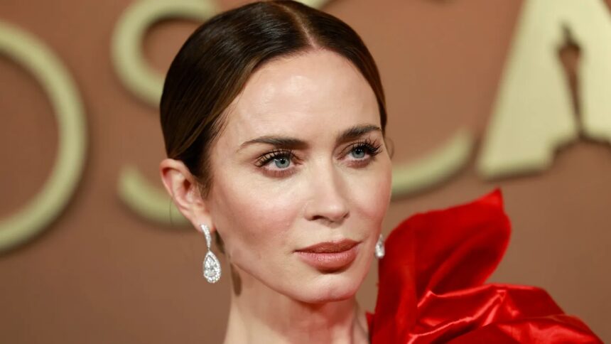 Emily Blunt red carpet French tip manicure with glossy red polish and pearl floral nail art design