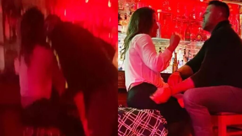 Mike Vrabel and Dianna Russini kissing at a luxury resort in Sedona, Arizona, appearing close and affectionate during a private moment outdoors