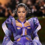 Teyana Taylor wearing bold couture at the Met Gala red carpet with dramatic styling and statement fashion look