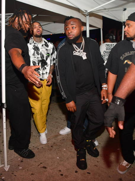 Davido and Chris Brown announcing their 2027 joint album collaboration blending Afrobeats and R&B