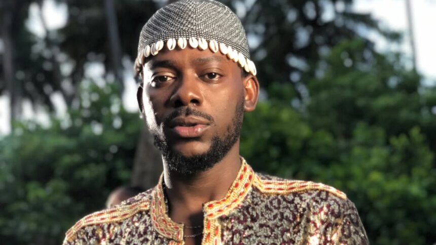 Adekunle Gold and Simi smiling together during a family moment after the singer clarified rumors about welcoming twins and revealed their newborn baby’s gender.