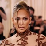 Jennifer Lopez showing off her toned figure and glowing confidence in a stylish fitted outfit during a viral celebrity appearance