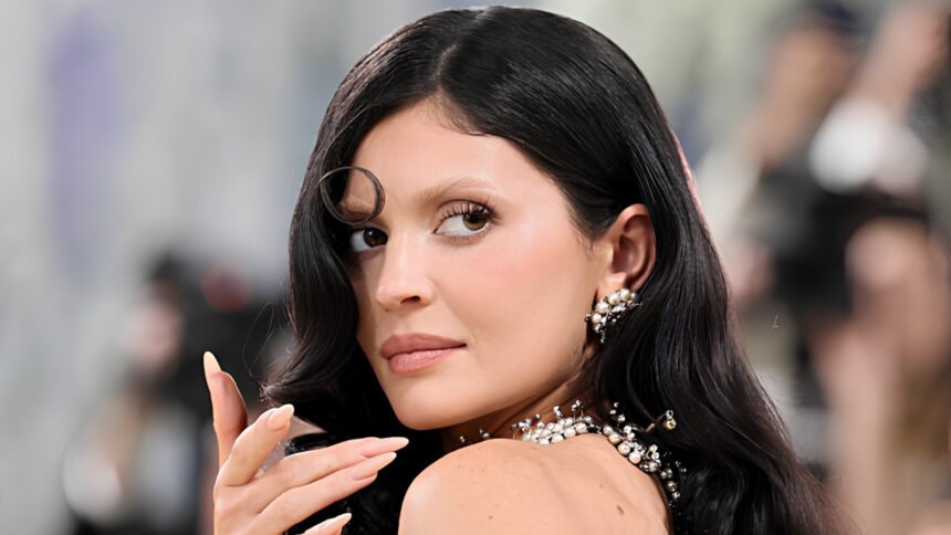 Kylie Jenner wearing a nude Schiaparelli sculptural dress with illusion details at the 2026 Met Gala