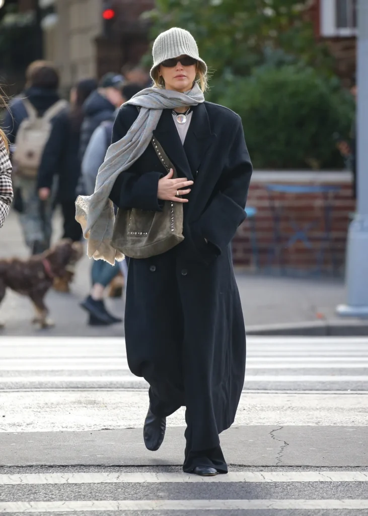 Lawrence with a Gimaguas studded tote in October 2025. 
