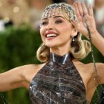 Sabrina Carpenter at the Met Gala 2026 wearing a 1920s-inspired faux bob hairstyle with sculpted curls, sparkling headpiece, and vintage glam makeup